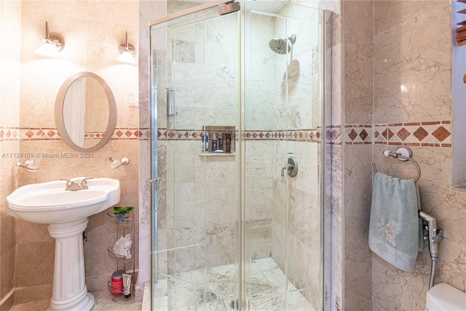 6181 Southwest 20th Street West Miami, FL 33155 - Photo 15 of 31 a bathroom with a sink a toilet and shower