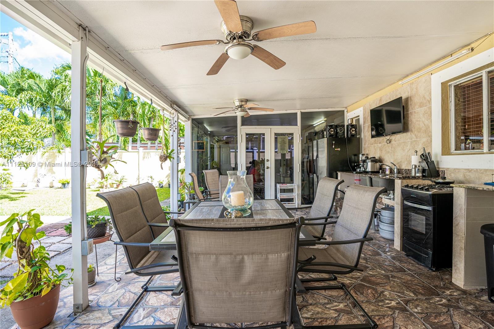 6181 Southwest 20th Street West Miami, FL 33155 - Photo 17 of 31 a view of a dining room with furniture window and outside view