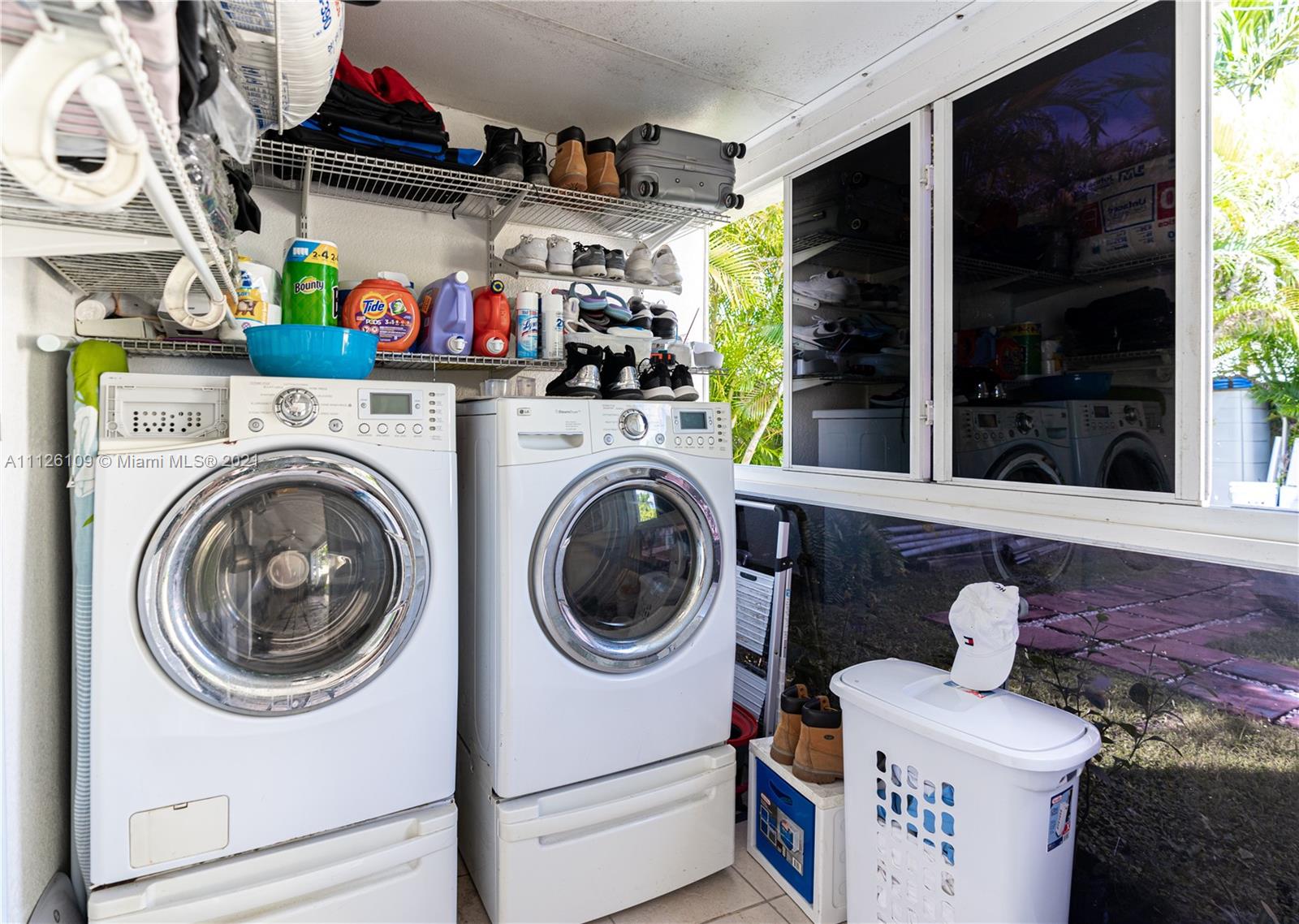 6181 Southwest 20th Street West Miami, FL 33155 - Photo 18 of 31 a utility room with dryer and washer
