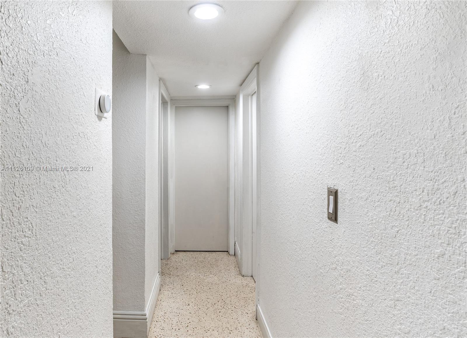 6181 Southwest 20th Street West Miami, FL 33155 - Photo 21 of 31 a view of a hallway