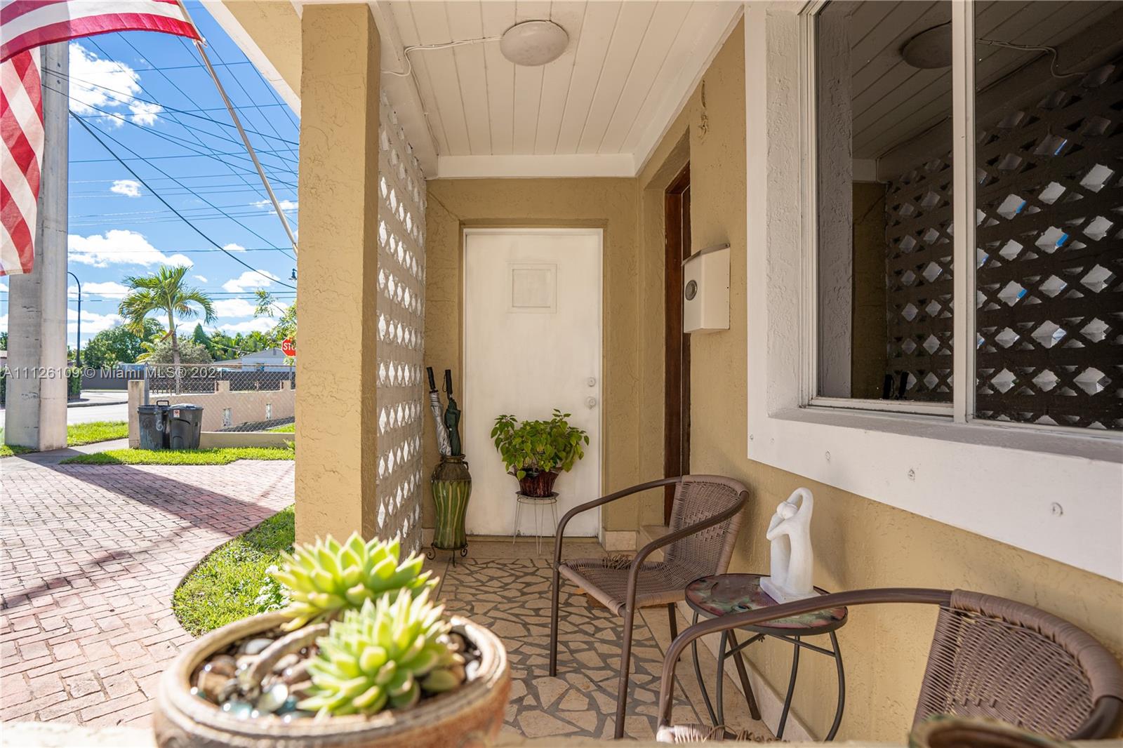 6181 Southwest 20th Street West Miami, FL 33155 - Photo 25 of 31 a view of a porch with chairs and potted plants