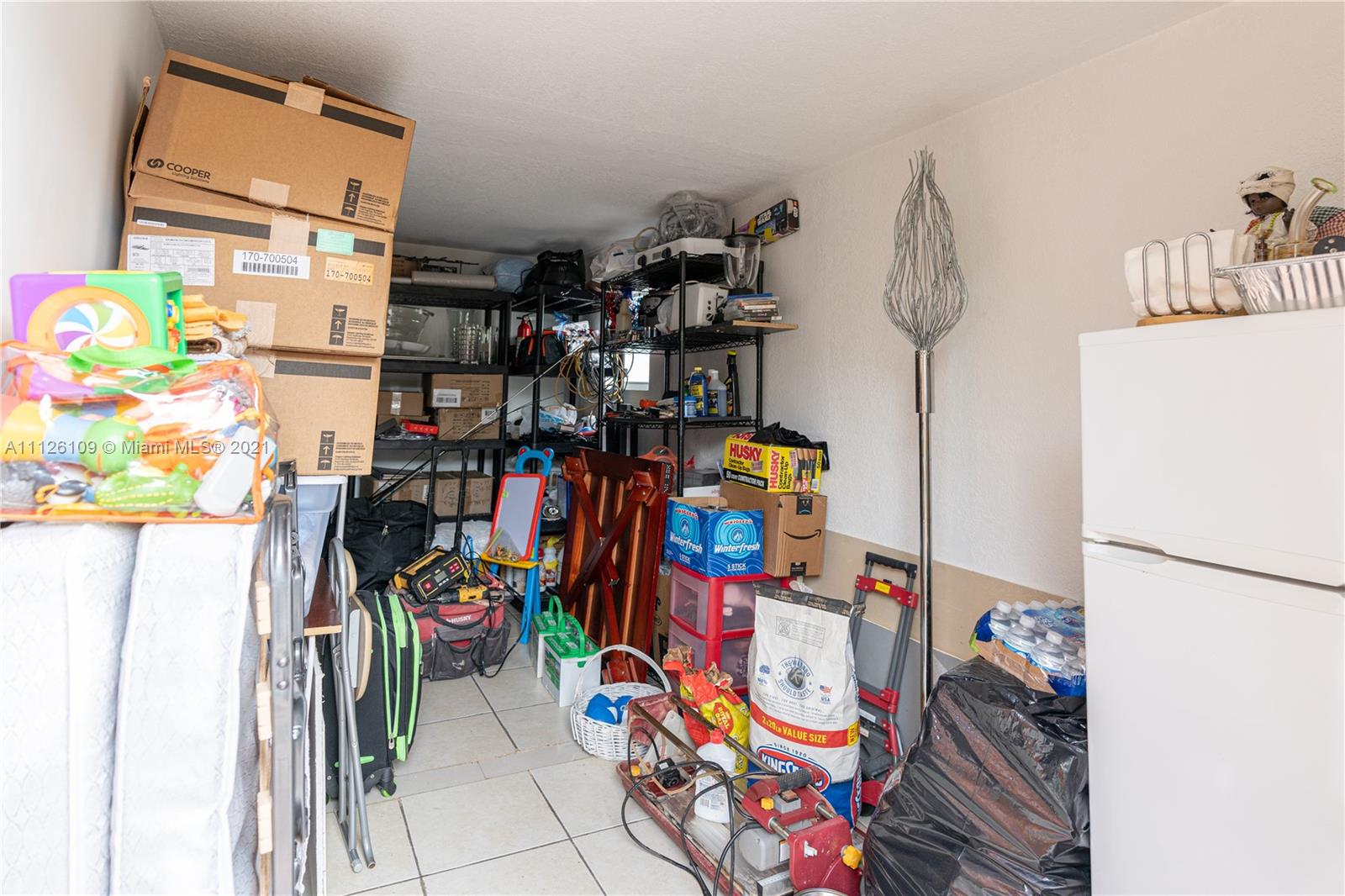 6181 Southwest 20th Street West Miami, FL 33155 - Photo 26 of 31 a view of storage and utility room