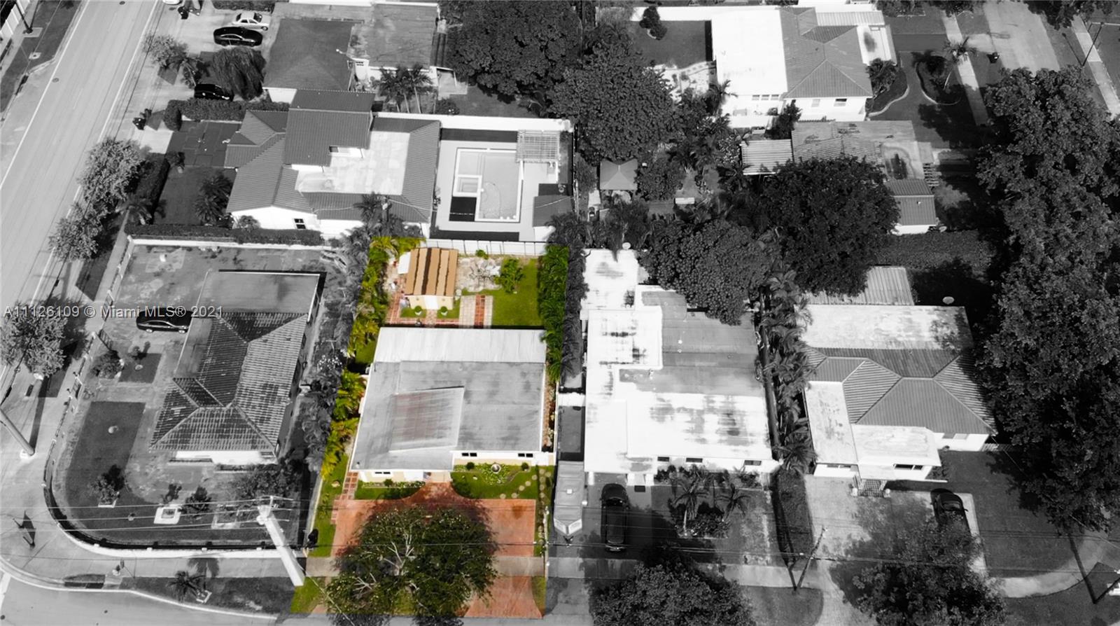 6181 Southwest 20th Street West Miami, FL 33155 - Photo 30 of 31 an aerial view of residential houses with outdoor space