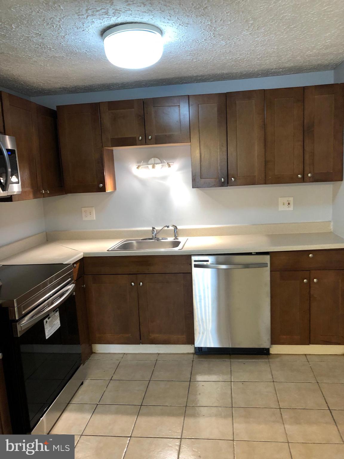 11228 Legato Way Silver Spring, MD 20901 - Photo 11 of 31 KITCHEN WITH CERAMIC TILE FLOOR