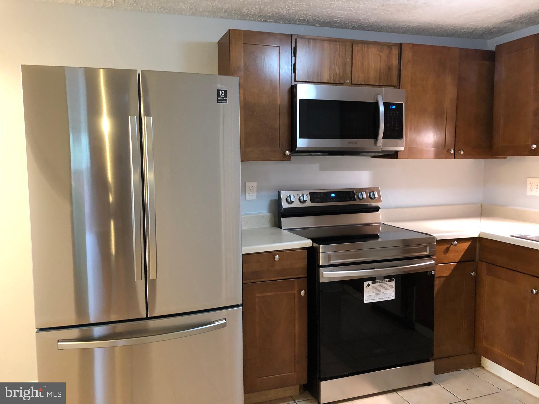 11228 Legato Way Silver Spring, MD 20901 - Photo 15 of 31 BRAND NEW STAINLESS STEEL APPLIANCES