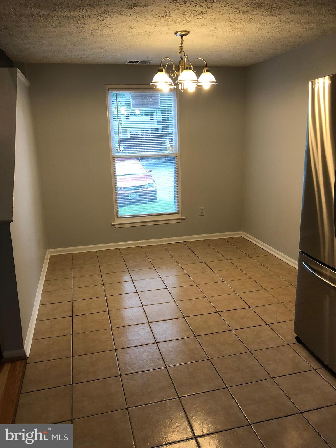 11228 Legato Way Silver Spring, MD 20901 - Photo 17 of 31 BRAKFAST AREA/DINING ROOM WITH SIDE WINDOWS