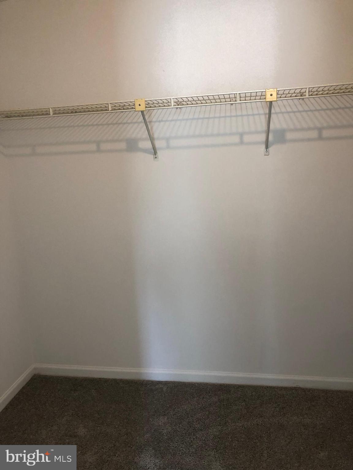 11228 Legato Way Silver Spring, MD 20901 - Photo 22 of 31 WALK IN CLOSET IN PRIMARY BEDROOM