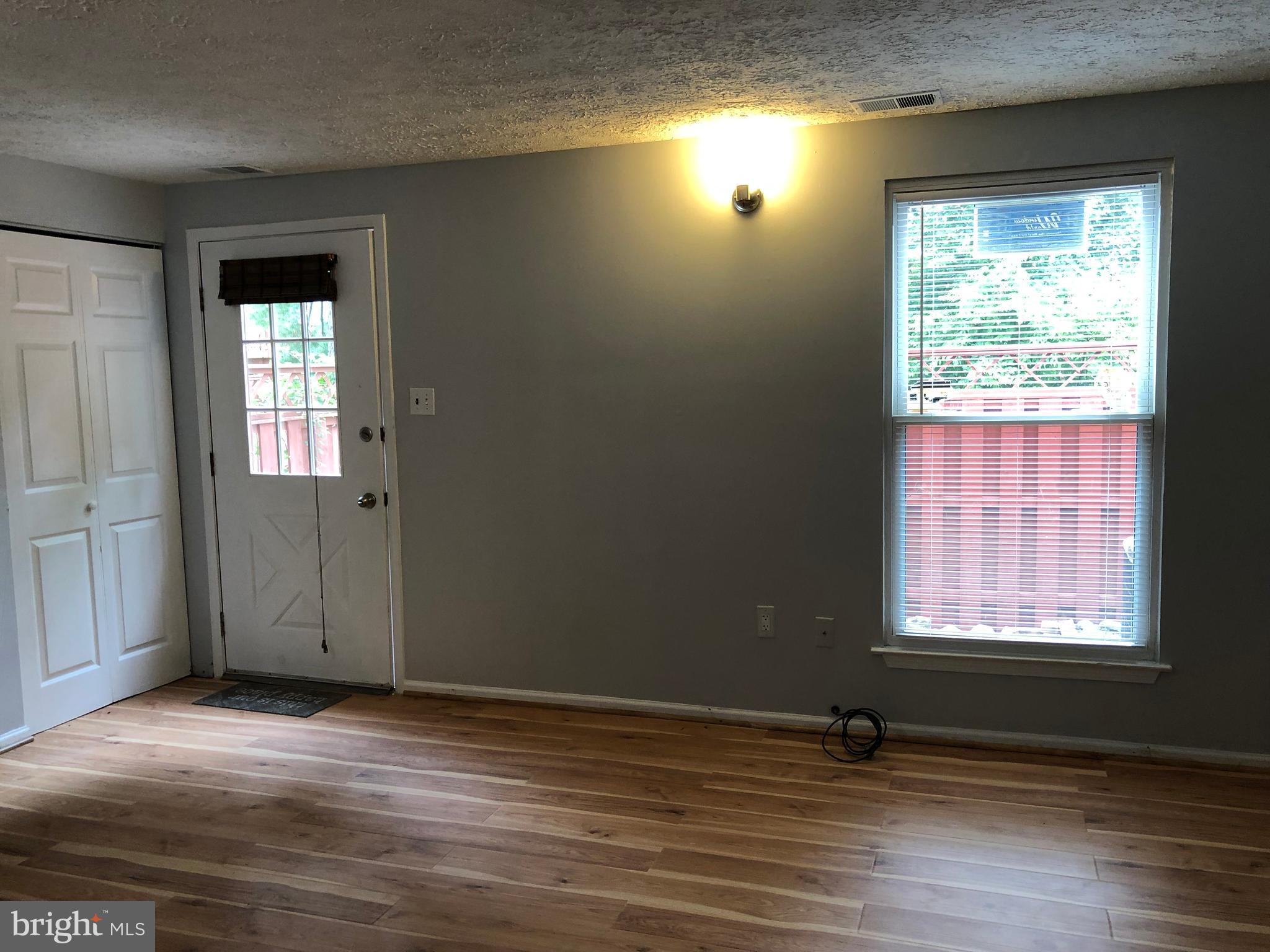 LIVING ROOM WITH WINDOWS