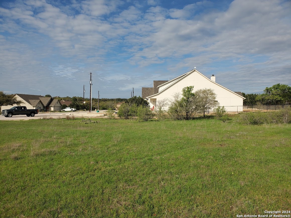 112 West Alex Jordan Blanco, TX 78606 - Photo 14 of 33 a view of a house with a yard