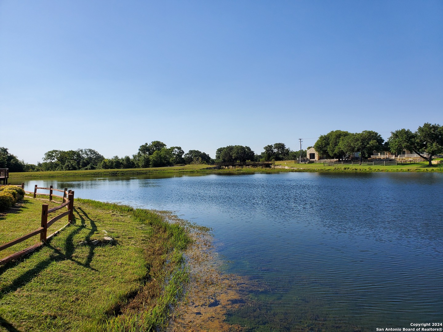 112 West Alex Jordan Blanco, TX 78606 - Photo 21 of 33 a view of a lake with houses in the back