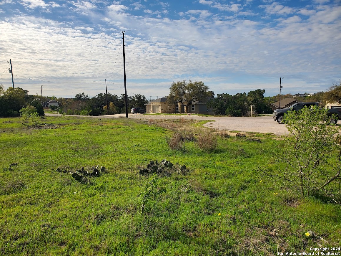 112 West Alex Jordan Blanco, TX 78606 - Photo 5 of 33 a view of a garden with lawn chairs