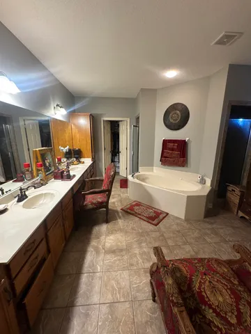 a open kitchen with stainless steel appliances kitchen island granite countertop a sink and cabinets