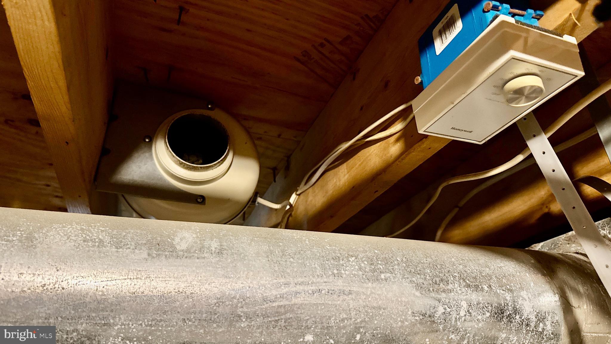 1934 North 23rd Street Philadelphia, PA 19121 - Photo 13 of 17 a bedroom with a bed and a lamp