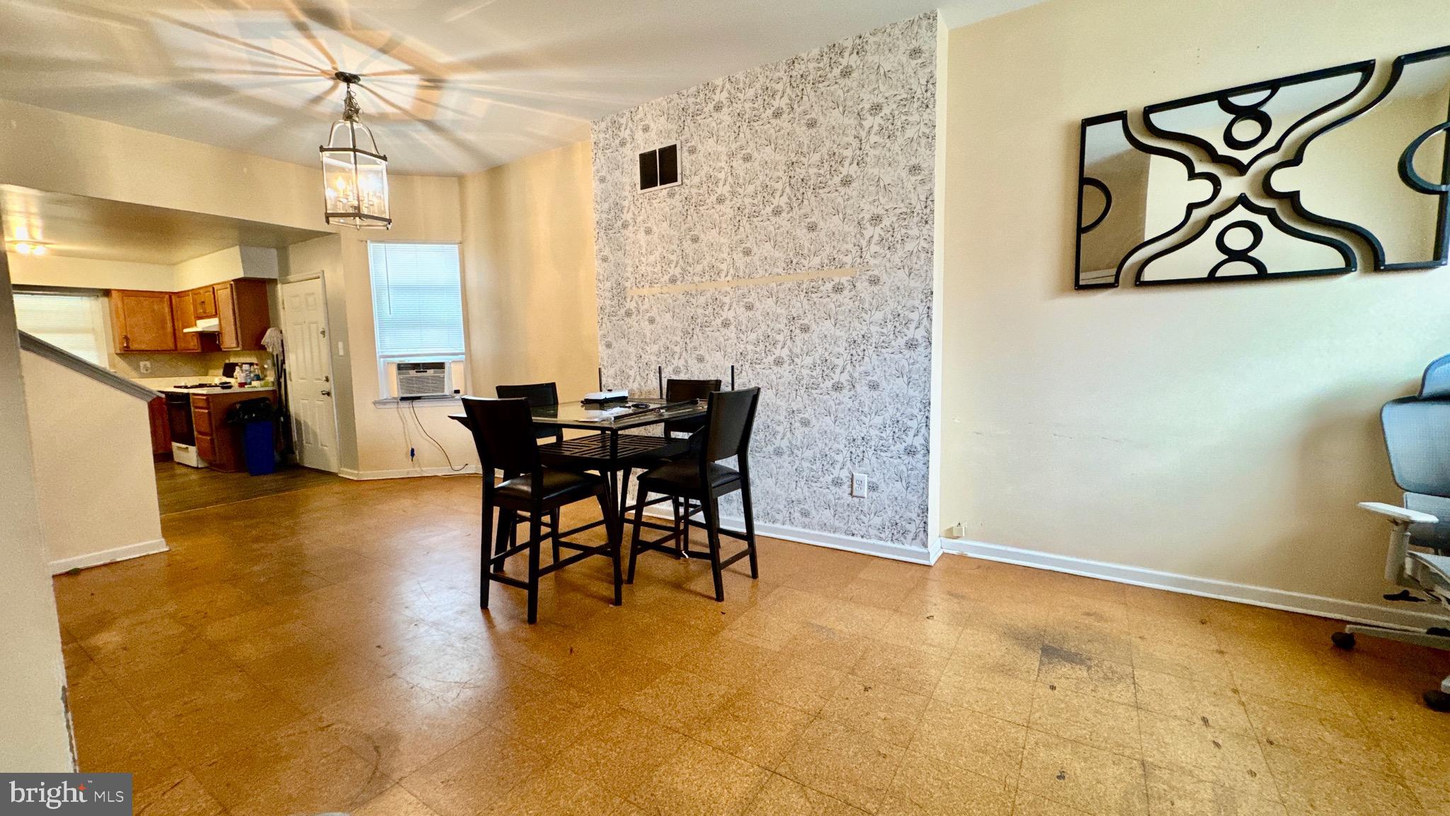 1934 North 23rd Street Philadelphia, PA 19121 - Photo 3 of 17 a view of a dining room with furniture and a chandelier
