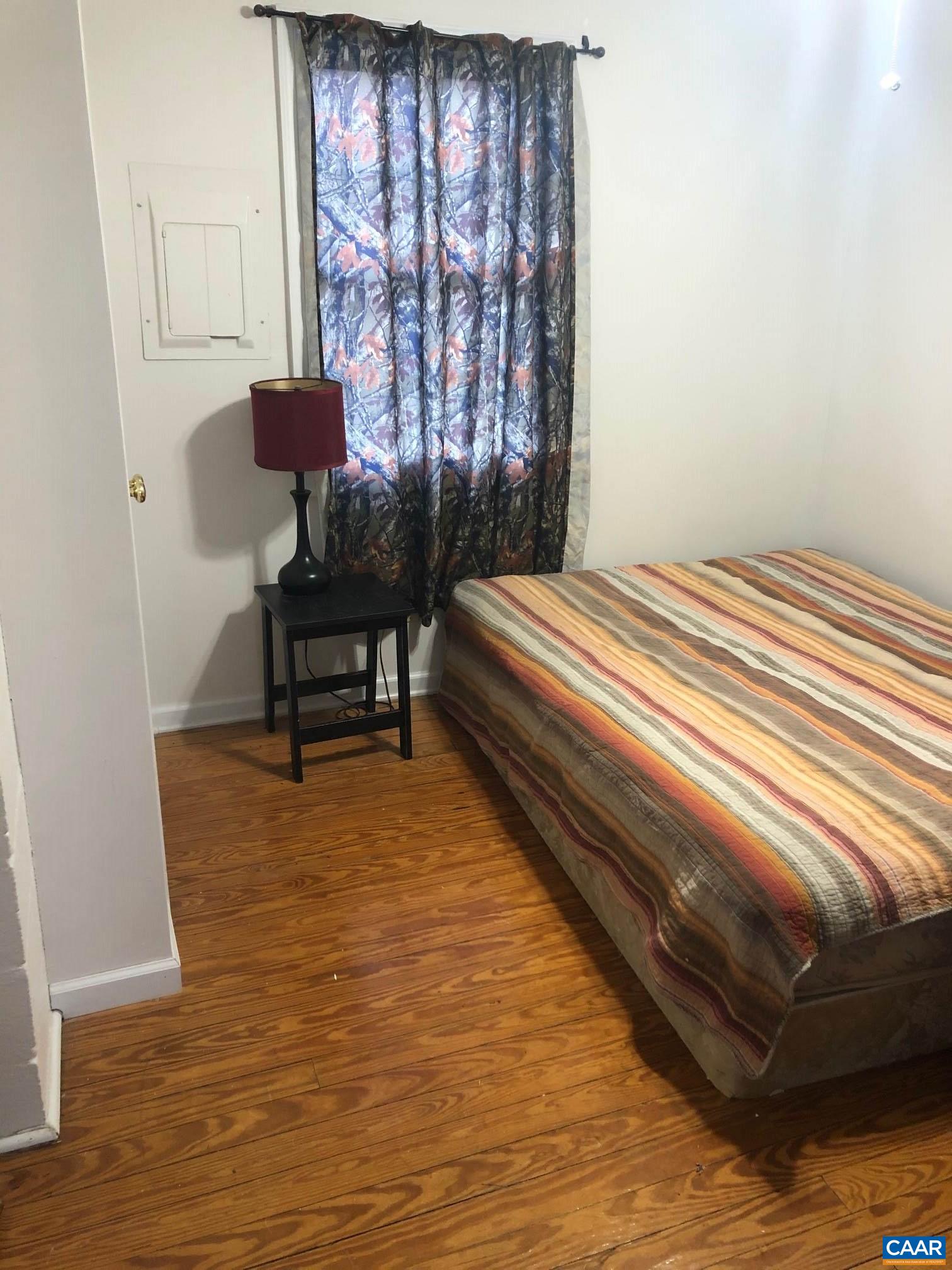 6473 Plank Road Afton, VA 22920 - Photo 11 of 66 a bedroom with a bed and a window