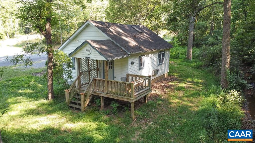 6473 Plank Road Afton, VA 22920 - Photo 4 of 66 a backyard of a house with table and chairs