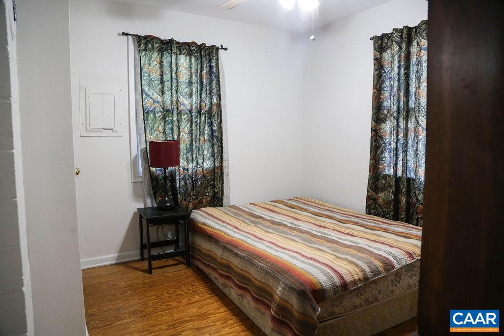 6473 Plank Road Afton, VA 22920 - Photo 44 of 66 a bedroom with a bed and a window