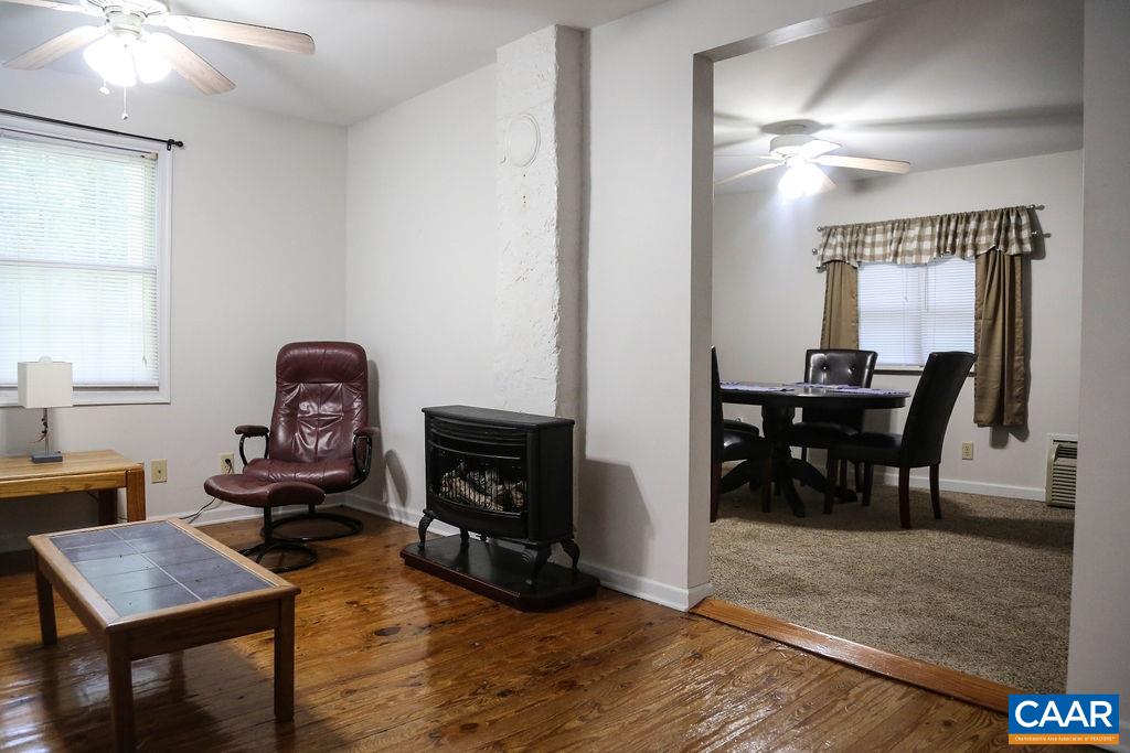 6473 Plank Road Afton, VA 22920 - Photo 48 of 66 a living room with furniture and a fireplace
