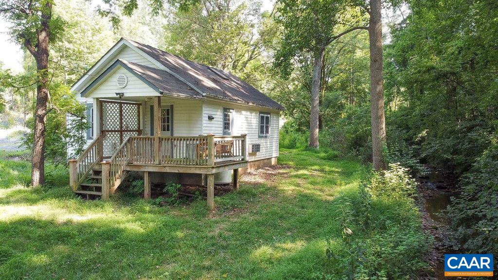 6473 Plank Road Afton, VA 22920 - Photo 5 of 66 a backyard of a house with table and chairs