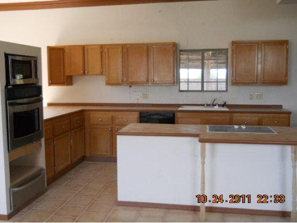 6020 Bice Road Rimrock, AZ 86335 - Photo 6 of 18 a kitchen that has a sink and a stove in it