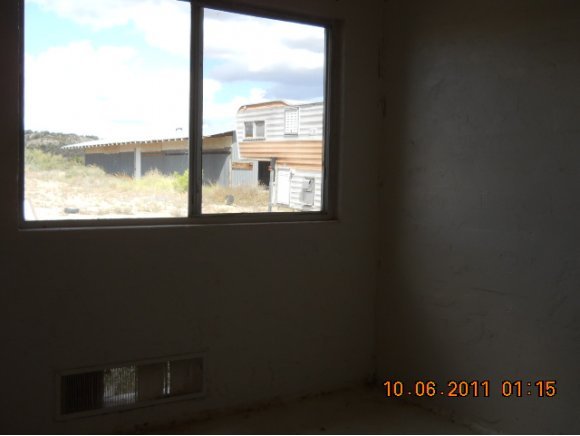 6020 Bice Road Rimrock, AZ 86335 - Photo 8 of 18 a view of an empty room with a window