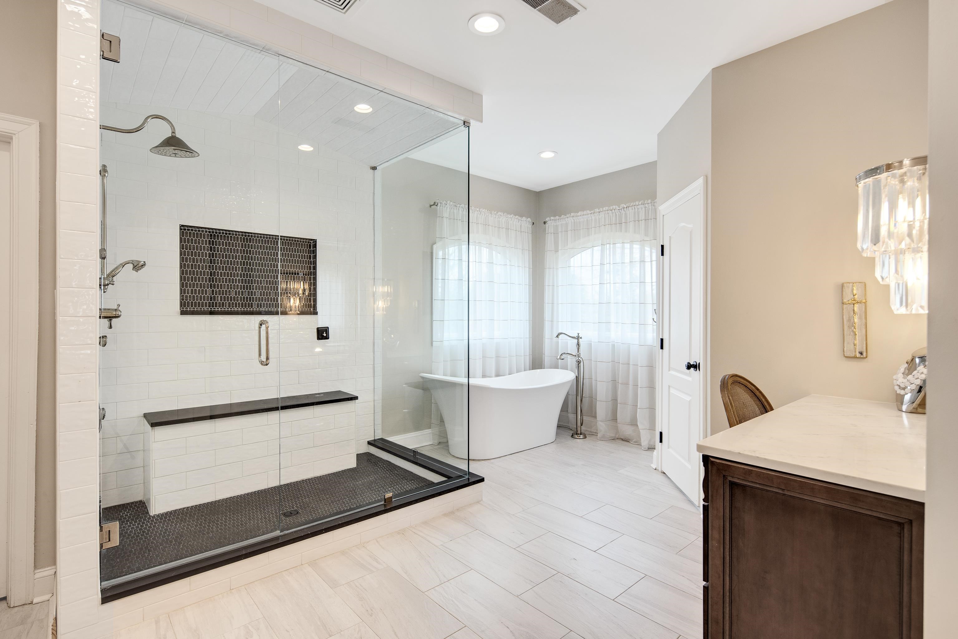 10471 Collierville Road Collierville, TN 38017 - Photo 13 of 40 Bathroom featuring recessed lighting, a soaking tub, and a shower stall