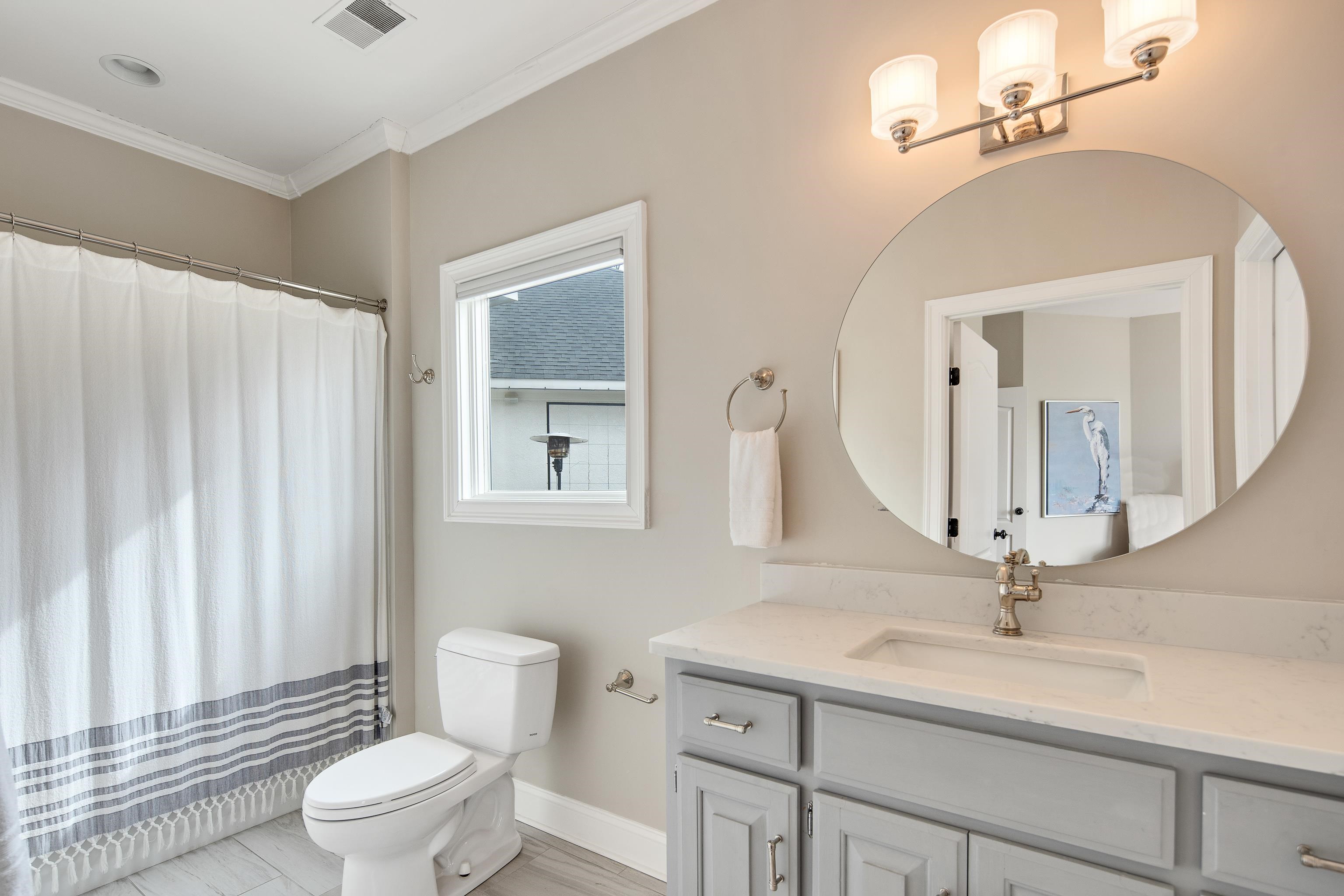 10471 Collierville Road Collierville, TN 38017 - Photo 16 of 40 Full bathroom featuring visible vents, baseboards, toilet, ornamental molding, and vanity