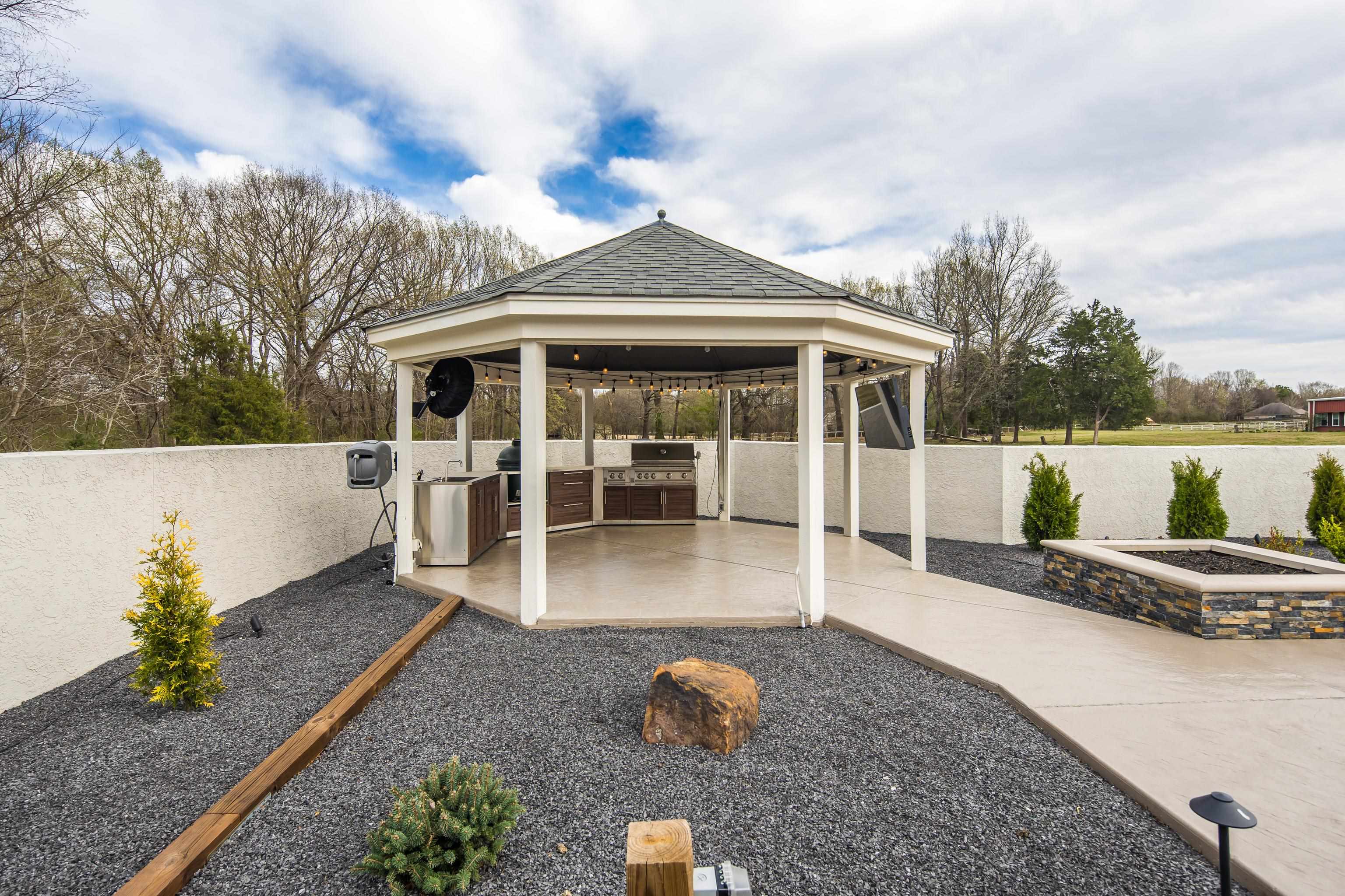 10471 Collierville Road Collierville, TN 38017 - Photo 29 of 40 View of patio / terrace with a gazebo, area for grilling, and fence private yard