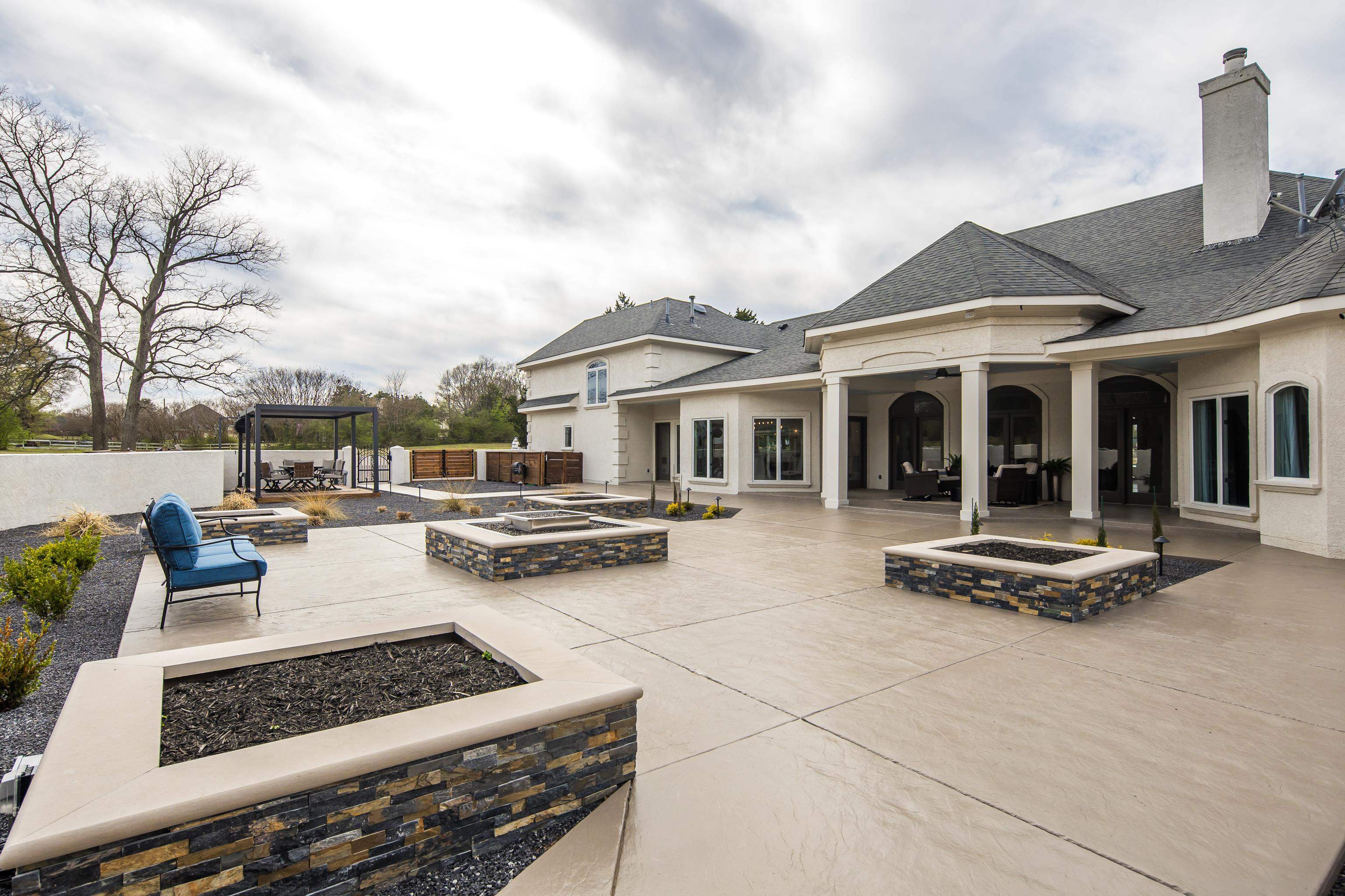10471 Collierville Road Collierville, TN 38017 - Photo 30 of 40 View of patio with a fire pit and fence
