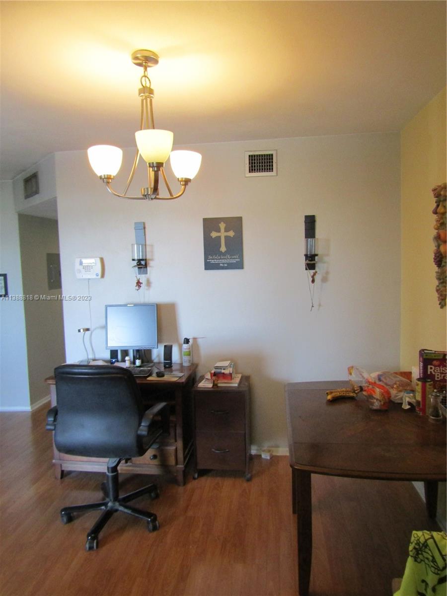 651 Pine Drive, Unit 309 Pompano Beach, FL 33060 - Photo 17 of 38 a view of a workspace with furniture