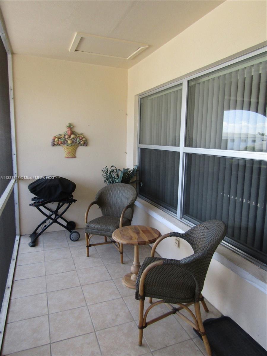 651 Pine Drive, Unit 309 Pompano Beach, FL 33060 - Photo 26 of 38 a outdoor living space with furniture