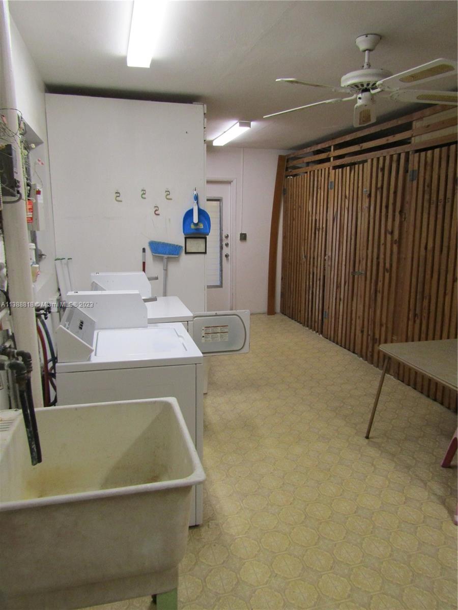 651 Pine Drive, Unit 309 Pompano Beach, FL 33060 - Photo 28 of 38 a bathroom with a sink and a mirror