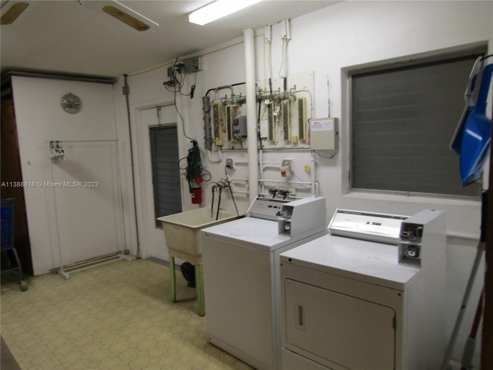 651 Pine Drive, Unit 309 Pompano Beach, FL 33060 - Photo 30 of 38 a room with storage and utility