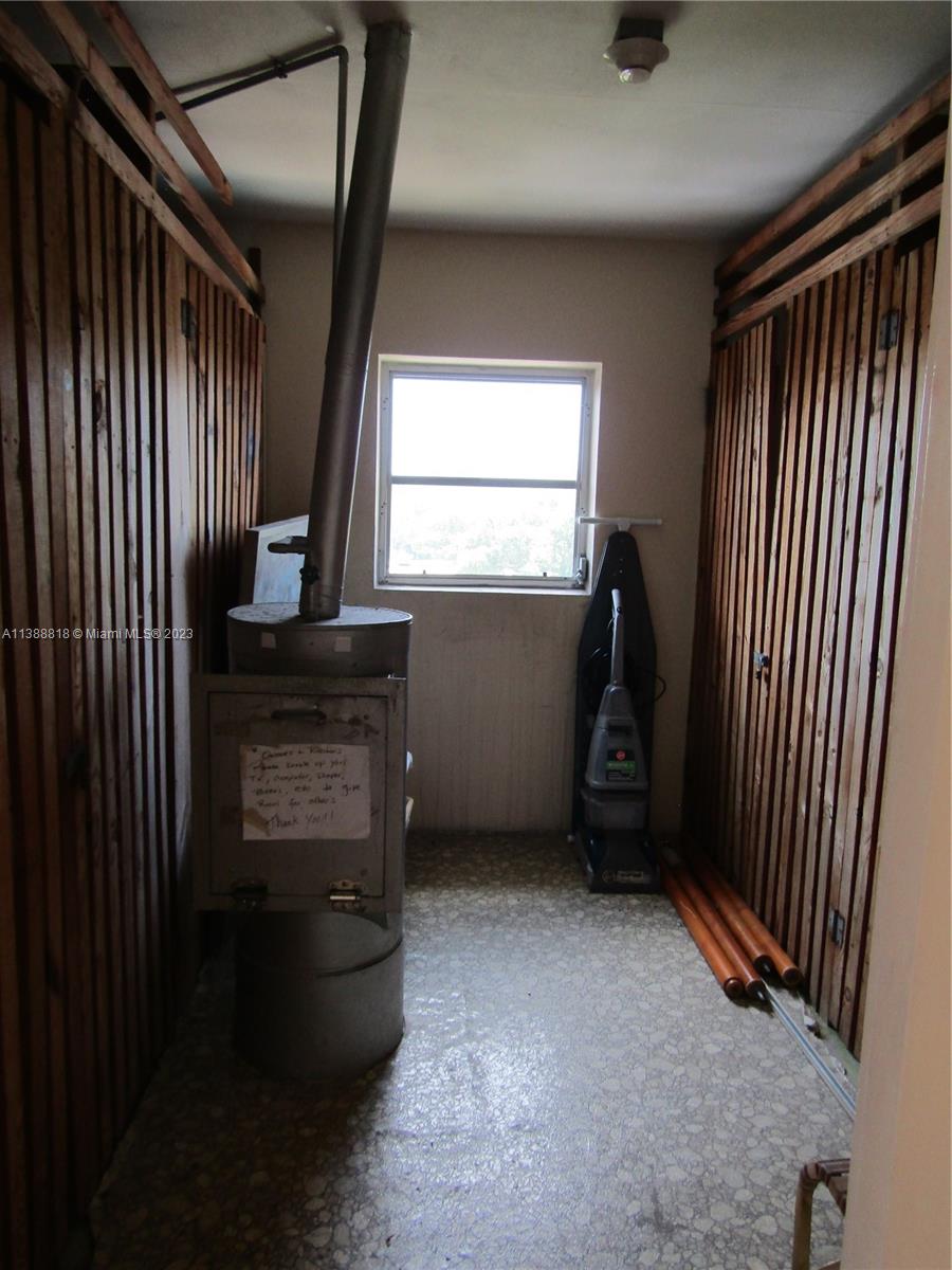 651 Pine Drive, Unit 309 Pompano Beach, FL 33060 - Photo 31 of 38 a view of an empty room with a fireplace