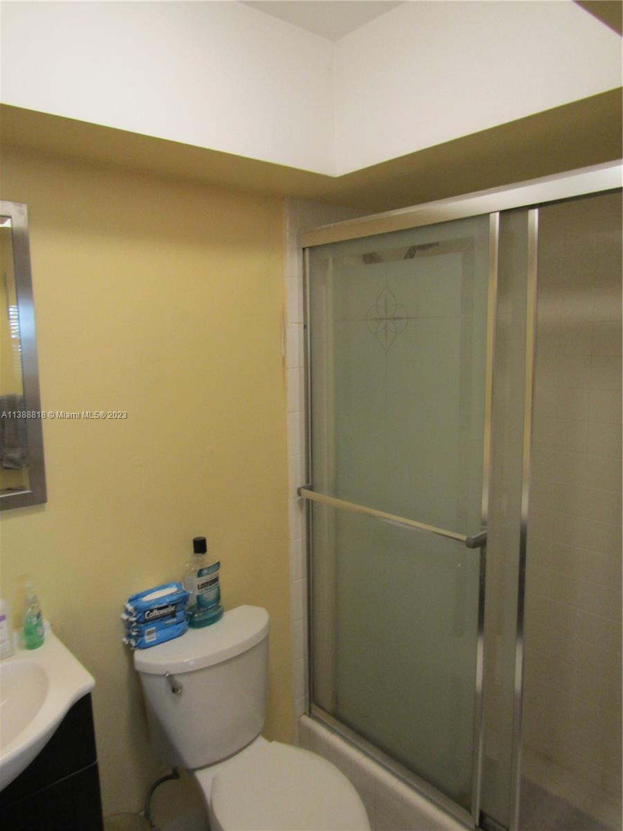 651 Pine Drive, Unit 309 Pompano Beach, FL 33060 - Photo 6 of 38 a bathroom with a toilet and a shower