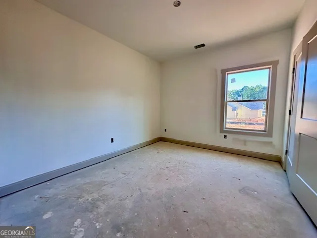 a view of a room that has a window in it