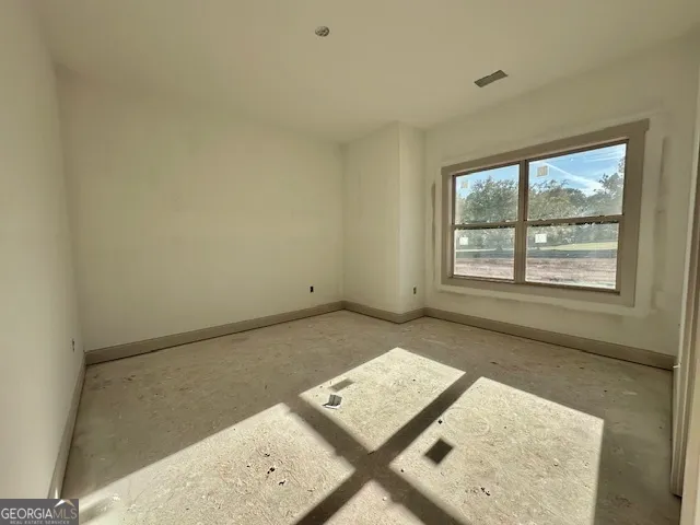 a view of an empty room with window