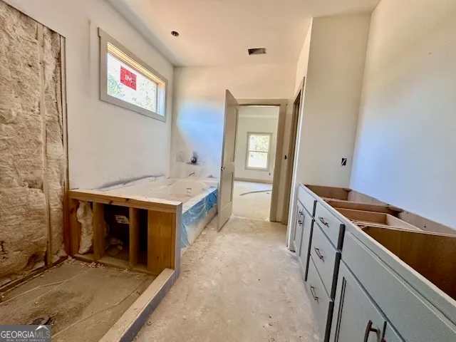 a kitchen with stainless steel appliances granite countertop a stove and a sink