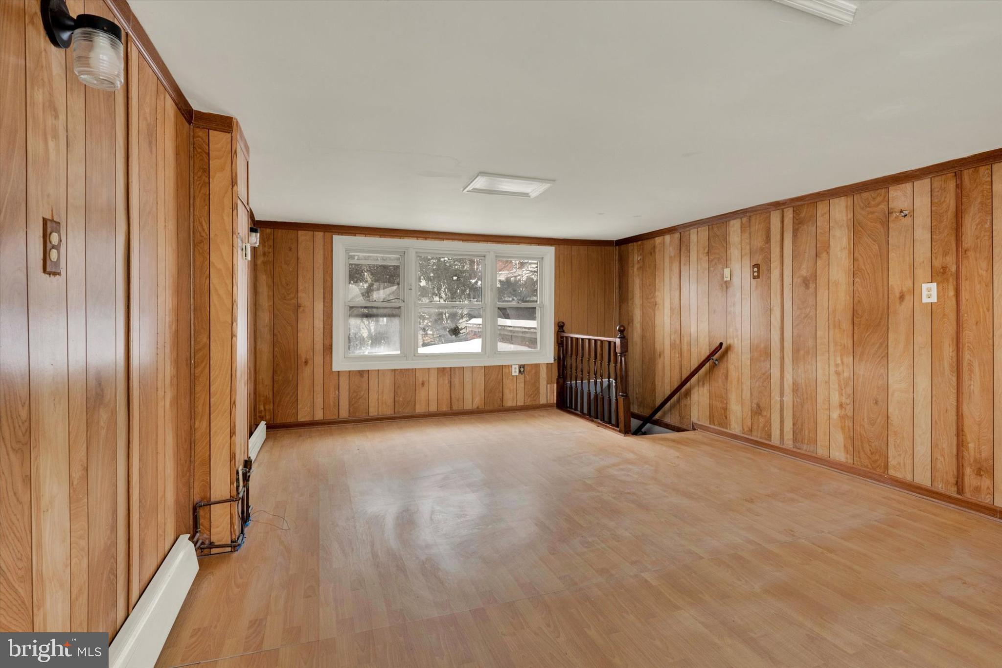 131 Mulberry Street Reading, PA 19601 - Photo 19 of 24 a view of an empty room with a window