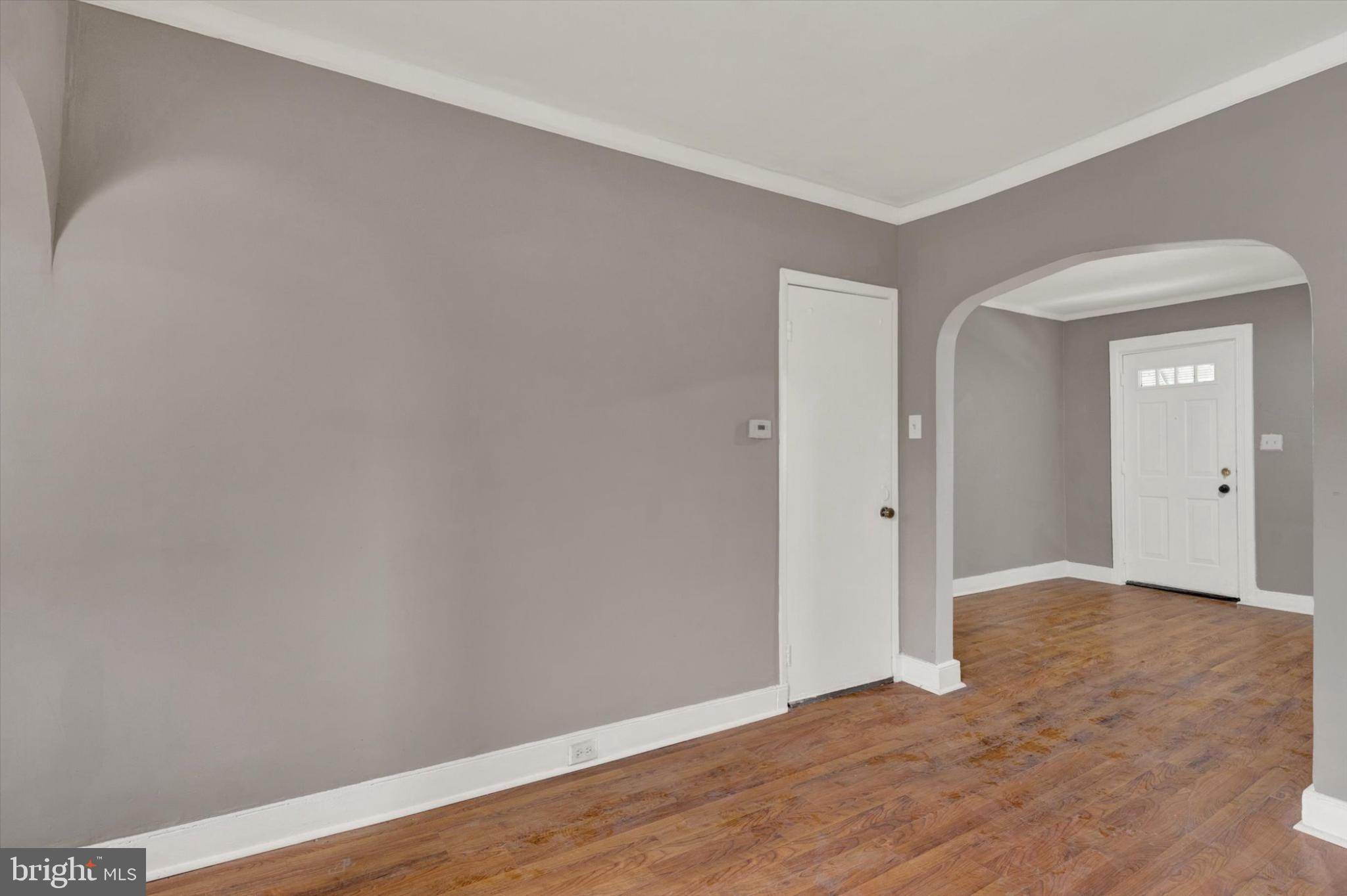 131 Mulberry Street Reading, PA 19601 - Photo 3 of 24 a view of an empty room with wooden floor