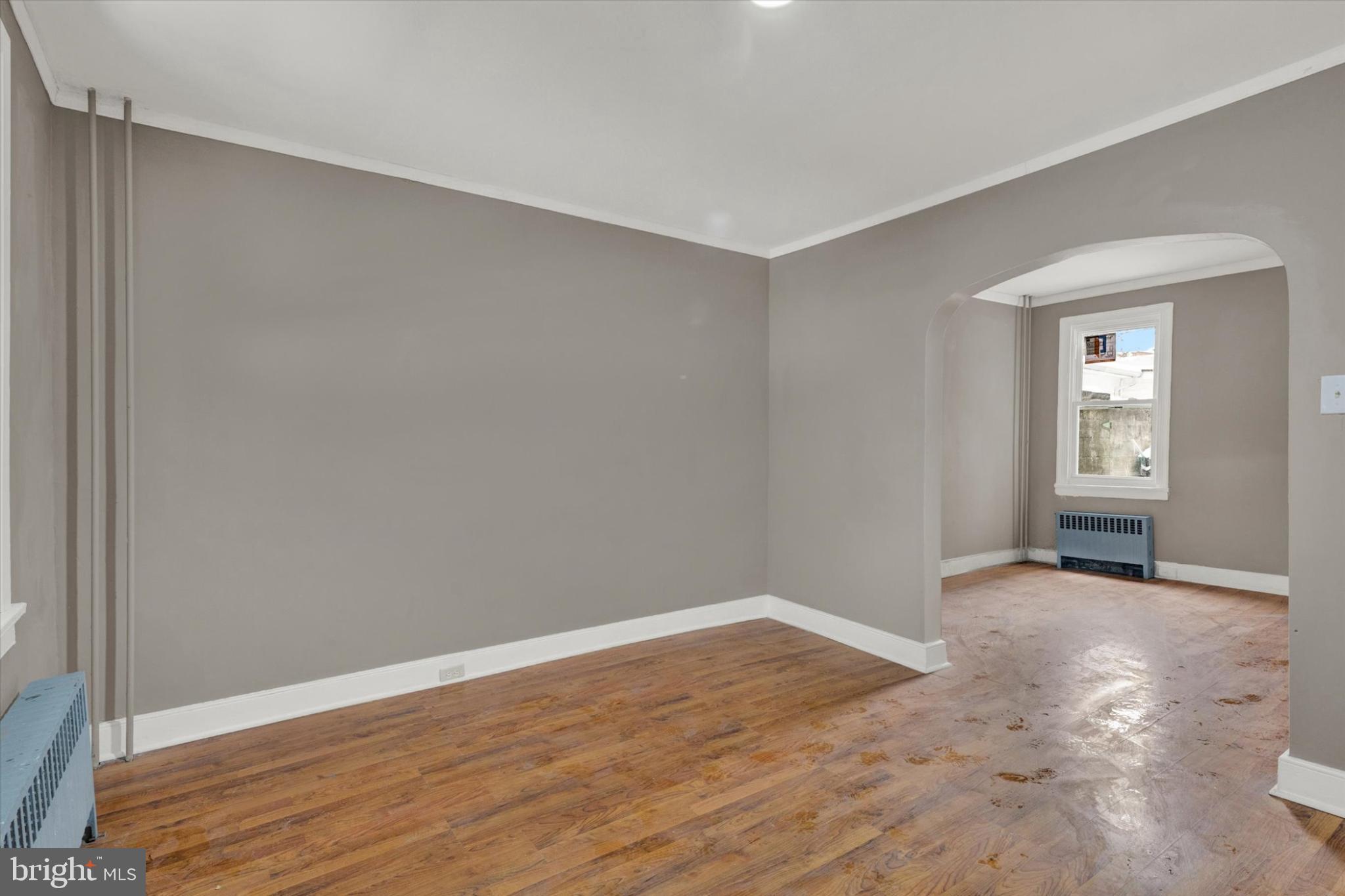 131 Mulberry Street Reading, PA 19601 - Photo 6 of 24 a view of an empty room with wooden floor and closet