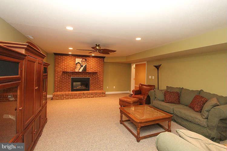 21030 Woodfield Road Gaithersburg, MD 20882 - Photo 24 of 30 Basement family room/media room