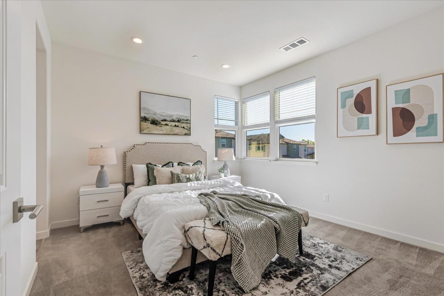1907 Joshua Tree Circle Milpitas, CA 95035 - Photo 11 of 37 a bedroom with a bed and glass windows