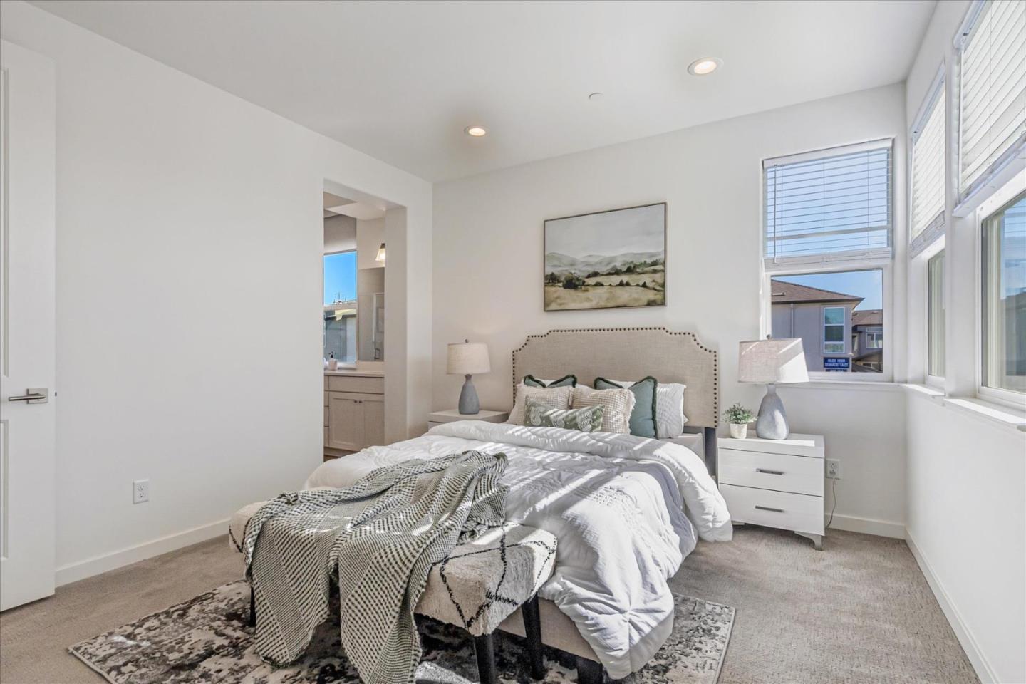 1907 Joshua Tree Circle Milpitas, CA 95035 - Photo 12 of 37 a bedroom with a bed and a painting on the wall