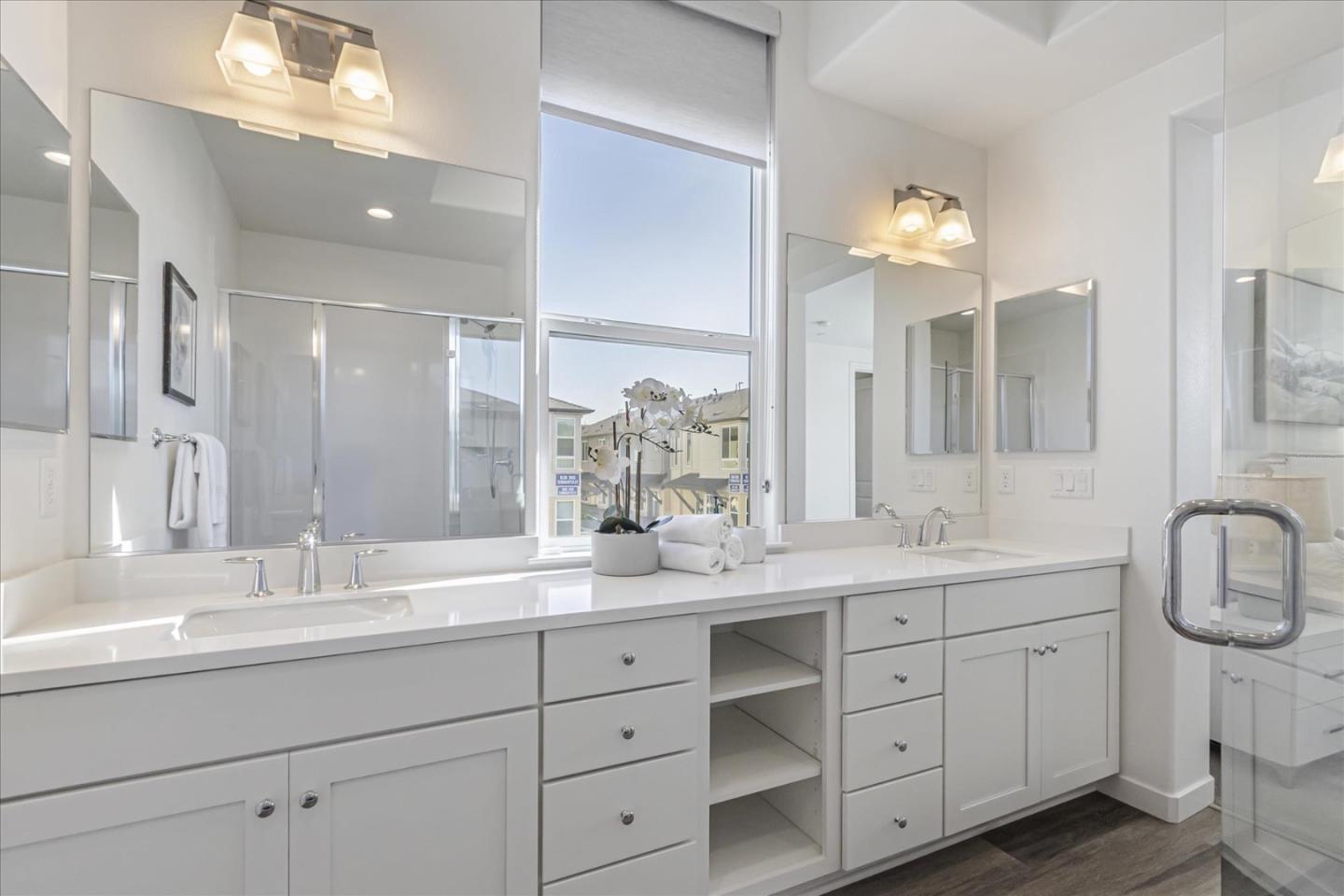 1907 Joshua Tree Circle Milpitas, CA 95035 - Photo 20 of 37 a bathroom with a double vanity sink mirror and next