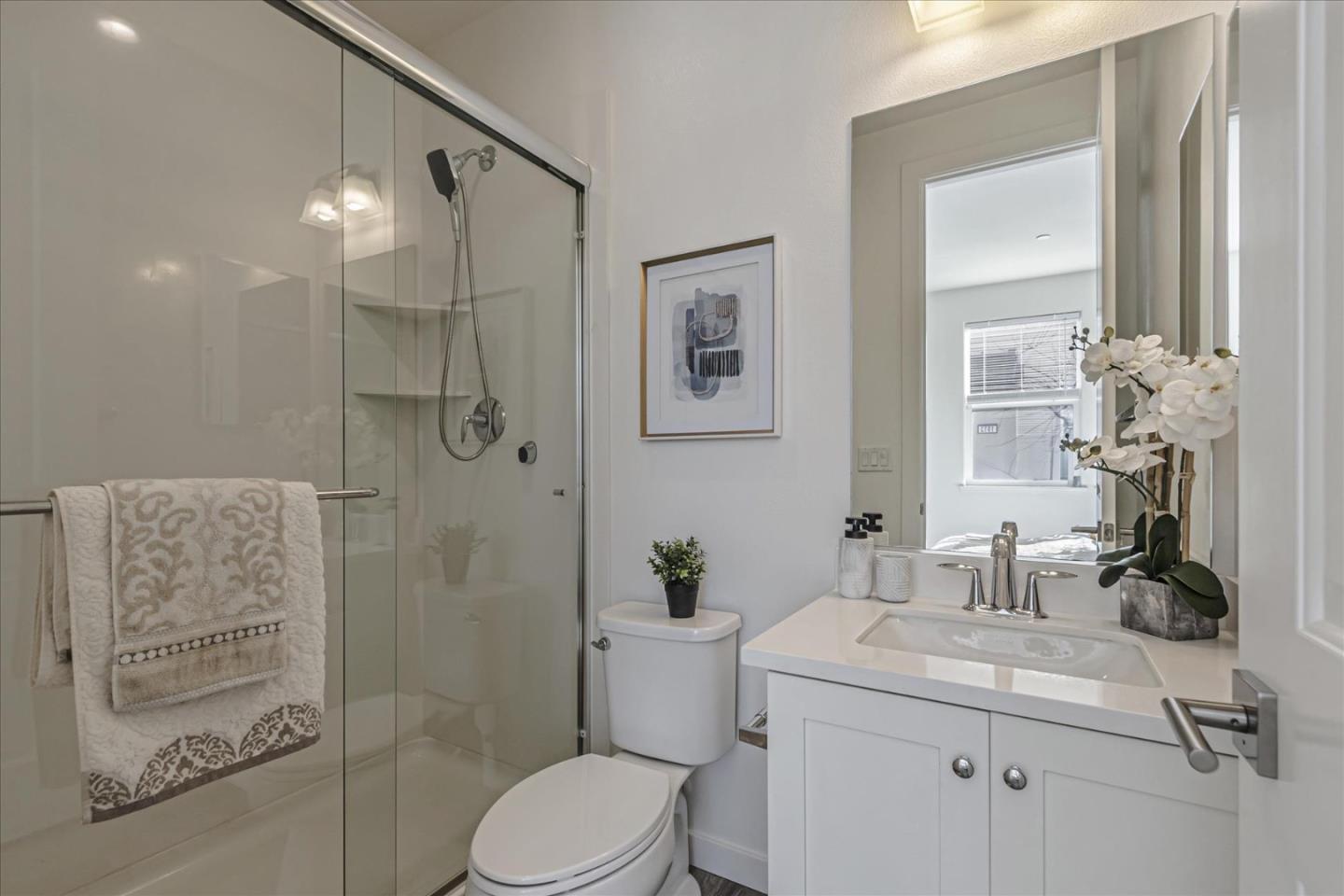1907 Joshua Tree Circle Milpitas, CA 95035 - Photo 22 of 37 a bathroom with a sink a toilet and shower