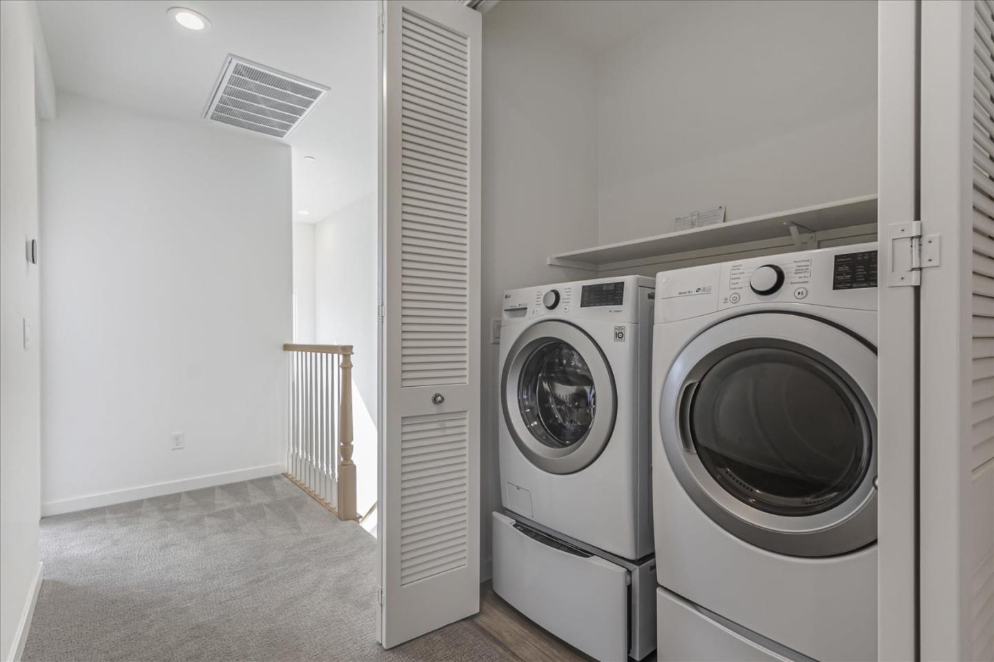 1907 Joshua Tree Circle Milpitas, CA 95035 - Photo 25 of 37 a view of a hallway with washer and dryer