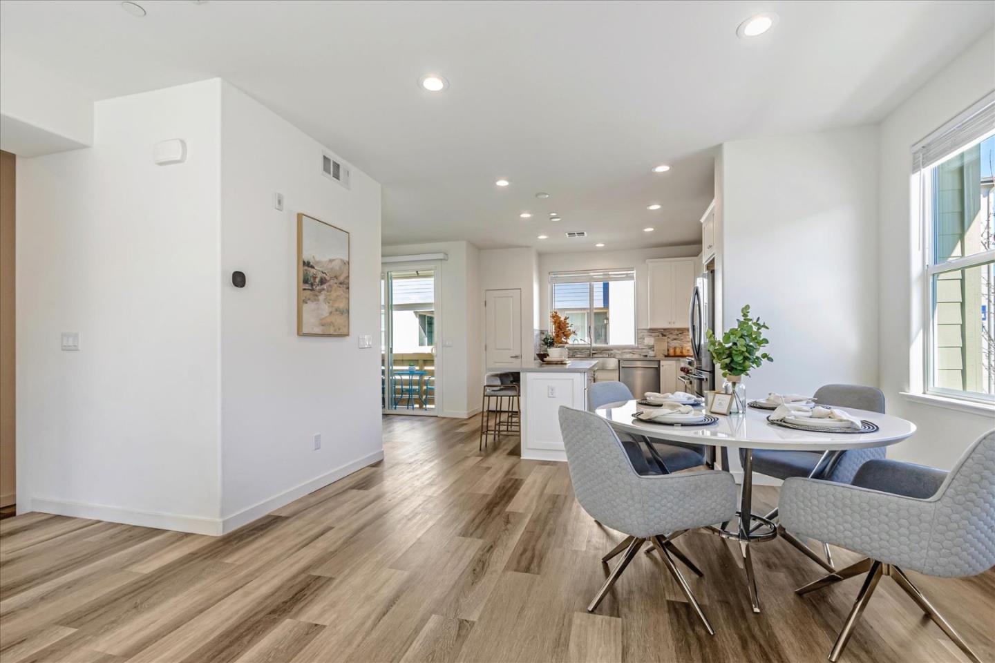 1907 Joshua Tree Circle Milpitas, CA 95035 - Photo 8 of 37 a view of a dining room with furniture and wooden floor