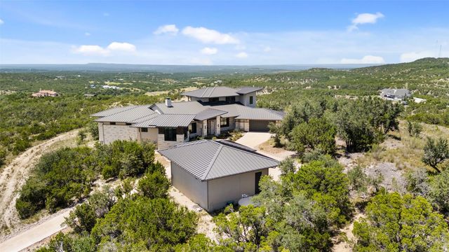 a aerial view of a house with a garden