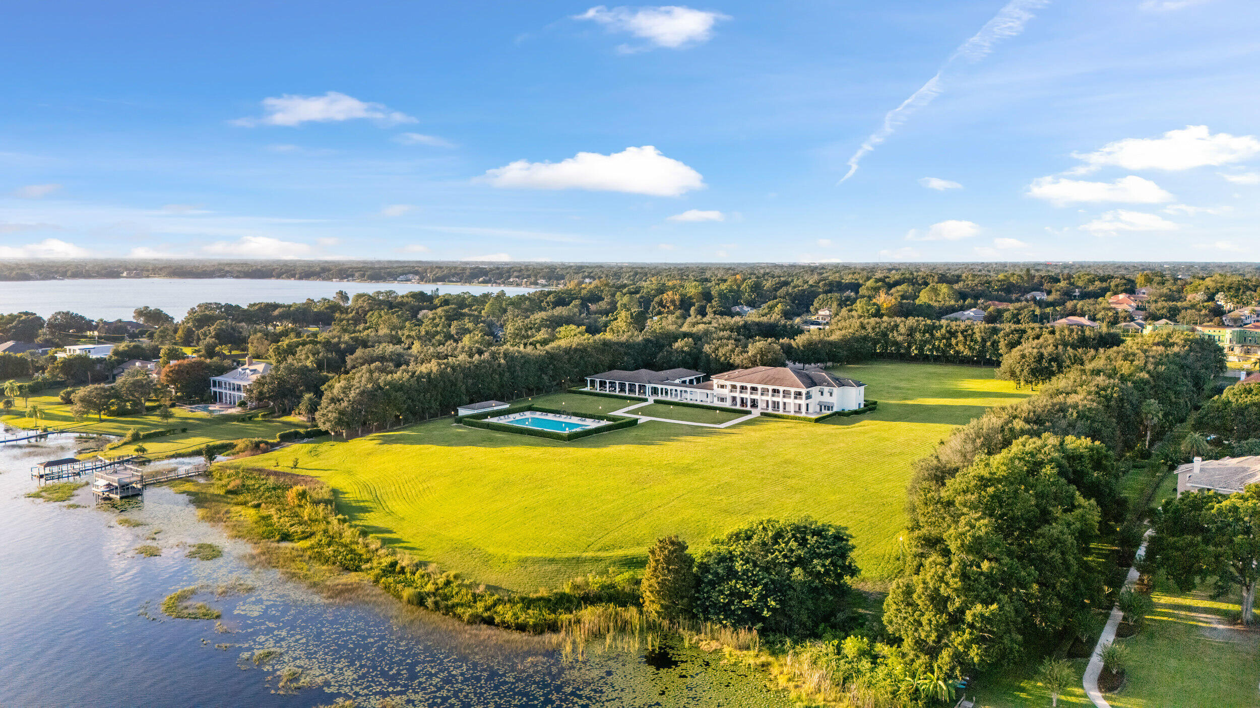 a view of a swimming pool with an ocean view